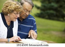 Senior couple reading the Bible Senior couple reading the Bible