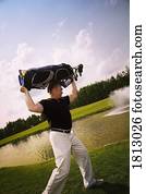 Side view of a frustrated golfer