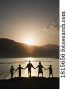 A group of people holding hands A group of people holding hands