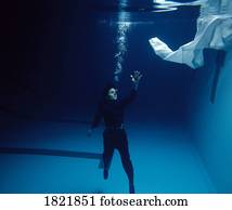 Drowning person reaching for help