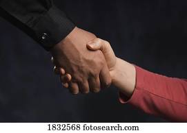 A man and woman shaking hands