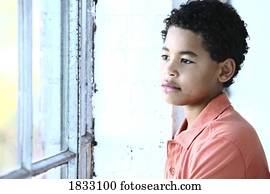 Boy looking out the window