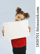 Girl holding up a book