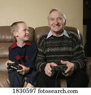 Grandfather and Grandson playing a game