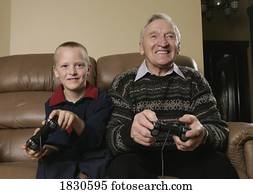 Grandfather and Grandson playing a game