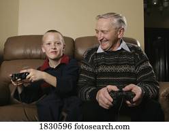 Grandfather and Grandson playing a game