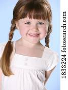 Portrait of little girl with braids