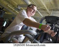 Senior on a workout machine