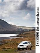 Lake District, Cumbria, England; car on the side of the road