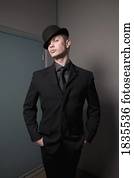 Man in business suit and bowler hat