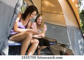 Two girls in a tent
