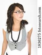 Woman wearing glasses and a vest