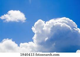 Cumulus clouds and blue sky