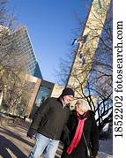 Edmonton, Alberta, Canada; Senior couple holding hands and walking