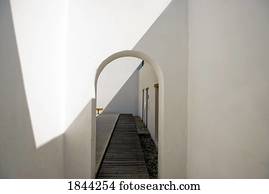Mexico; White corridor with arched doorway
