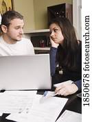 Young couple with financial stress
