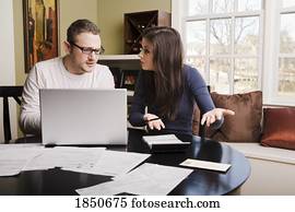 Young couple with financial stress