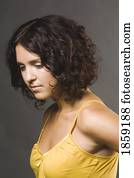 Woman in a yellow tank top