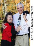 a couple in the park in autumn a couple in the park in autumn