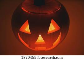 a pumpkin carved into a happy face