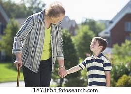 a senior woman and a boy