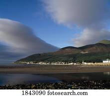 Rugged Coastline With A View Into Land And A Village