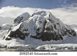A rugged mountain covered with snow; antarctica