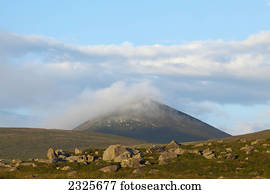Low cloud covering a hilltop;County kerry ireland