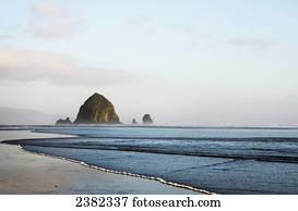 Haystack Rock at Cannon Beach, a famous landmark; Cannon Beach, Oregon, United States of America