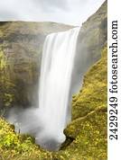 A majestic waterfall and mist; Iceland