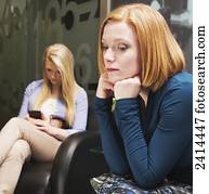 Candidates waiting for a job interview in a lobby; Edmonton, Alberta, Canada