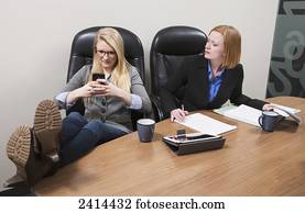 Intern receiving text messages during work hours; Edmonton, Alberta, Canada