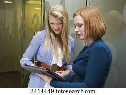 Supervisor assisting intern with procedures; Edmonton, Alberta, Canada