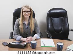 Young woman interning to be an accountant; Edmonton, Alberta, Canada