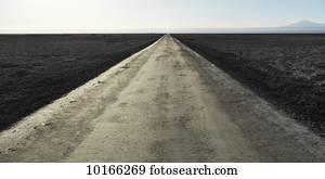 A road through a barren land; San Pedro de Atacama, Antofagasta Region, Chile