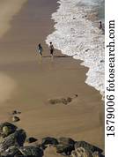 Couple Walking On Bondi Beach Couple Walking On Bondi Beach