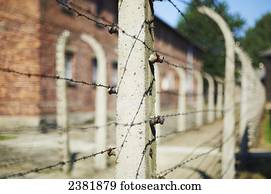 Detail of barbed wire fence in Auschwitz concentration camp; Osweciem, Poland