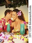 Hawaii, Oahu, Couple At A Restaurant At Sunset. Hawaii, Oahu, Couple At A Restaurant At Sunset.