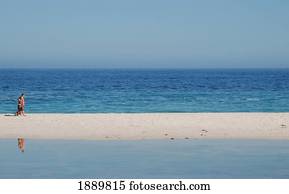 People Walking Along Beach People Walking Along Beach