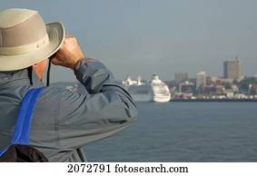 Tourist Viewing Ships In Saint John Harbour, New Brunswick