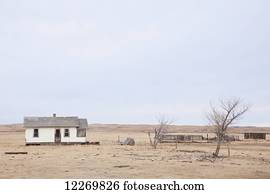 Abandoned homestead on a failed farm or ranch on the Prairies; Alberta, Canada