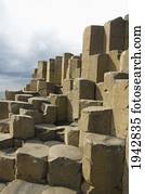 Black Basalt Columns Sticking Out Of The Sea, Giant's Causeway, Northern Ireland, United Kingdom