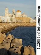 Cathedral and rugged waterfront; Cadiz, Andalusia, Spain