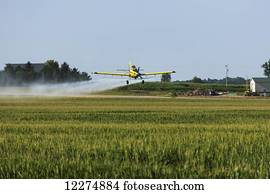 duster crop spraying field corn near iowa coggon america states united fotosearch