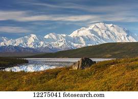 Scenic autumn view of Mt. McKinley and Wonder Lake partially covered with ice, Denali National Park, Interior Alaska