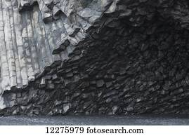 Hexagonal basalt columns rise out of the earth near the beaches of Vik; Iceland