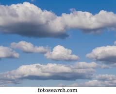 Cumulus clouds in a blue sky