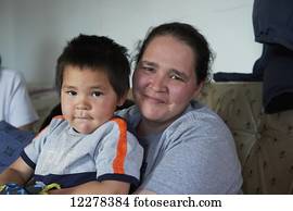 Portrait of Inuit mother and son; Cambridge Bay, Victoria Island, Nunavut, Canada