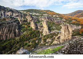 Landscape of rugged cliffs and autumn foliage; Meteora, Greece
