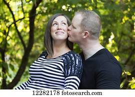 Portrait of a couple expecting a baby; Langley, British Columbia, Canada